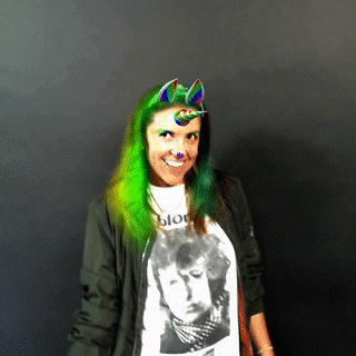 An augmented reality photo booth GIF of a guest with a unicorn horn