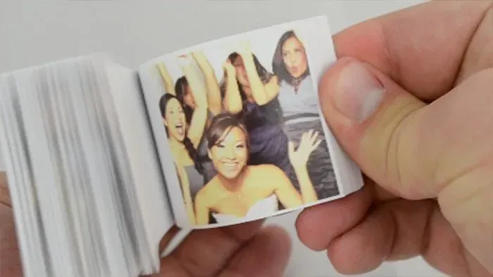 Bride enjoys her Wedding Flipbook with her bridesmaids & Action Flipbooks